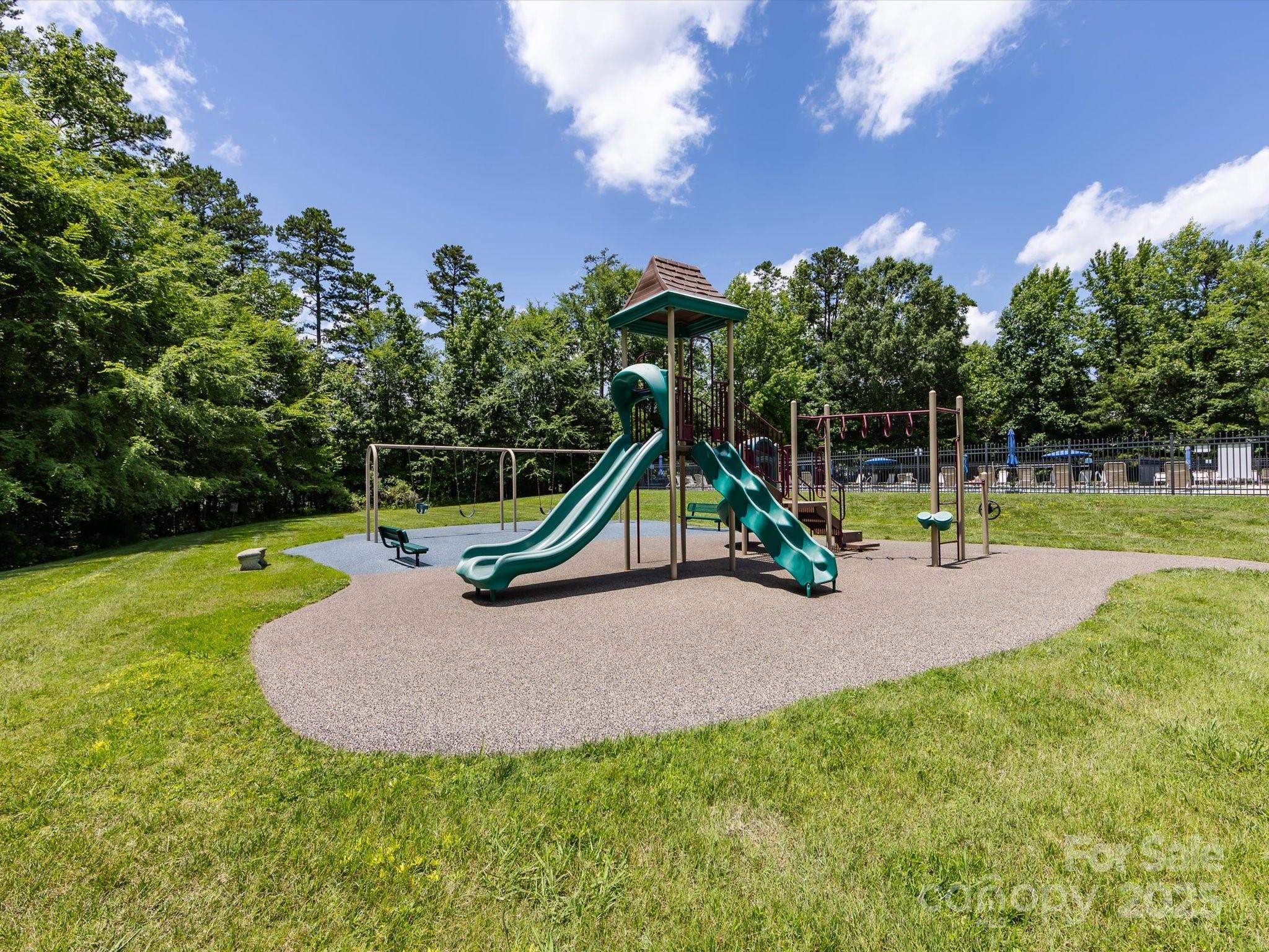 4148 Cedar Point Avenue Matthews, NC 28104 - Photo 45 of 48 a view of a park with swings
