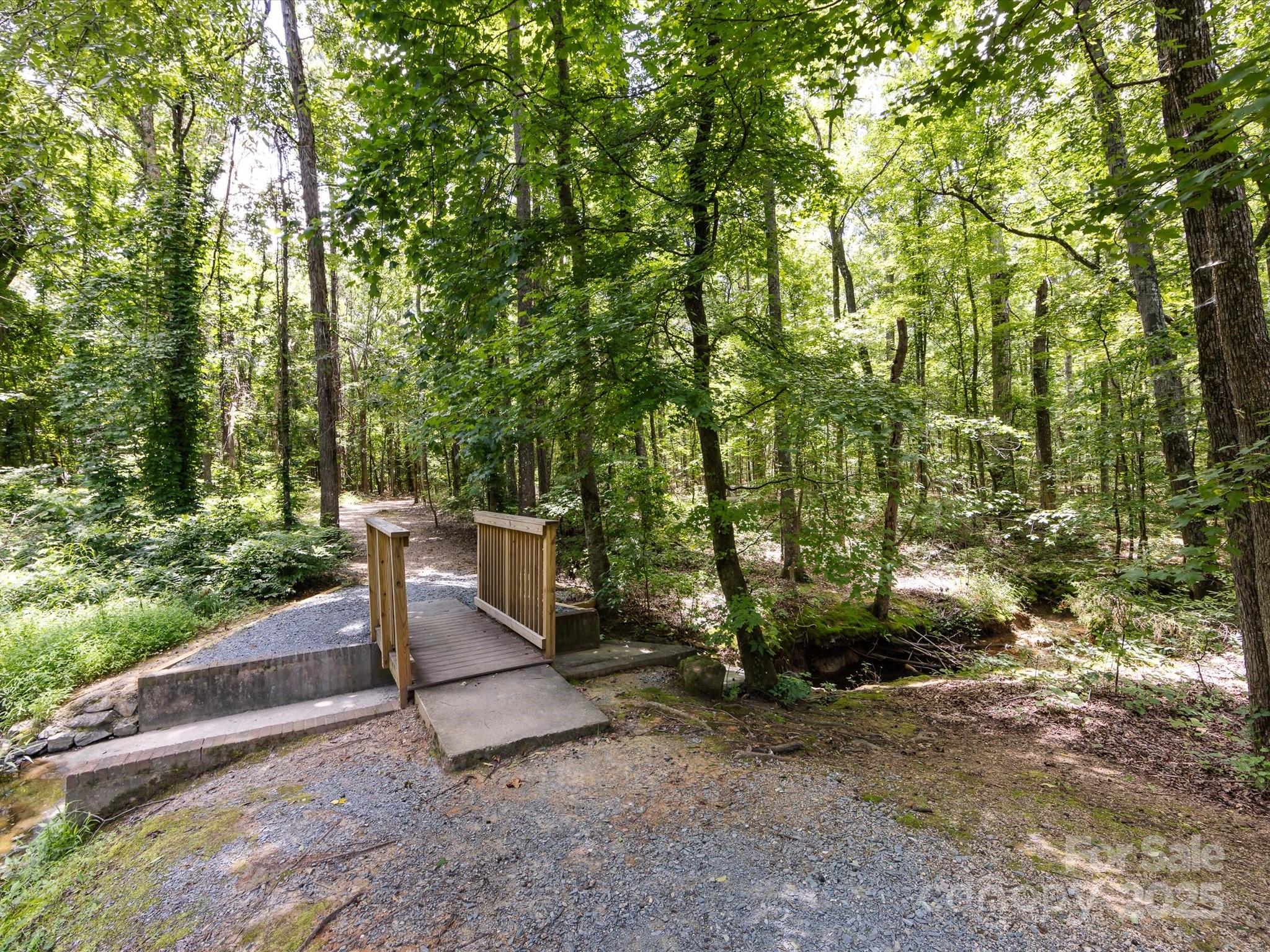4148 Cedar Point Avenue Matthews, NC 28104 - Photo 48 of 48 a view of a bench in a garden