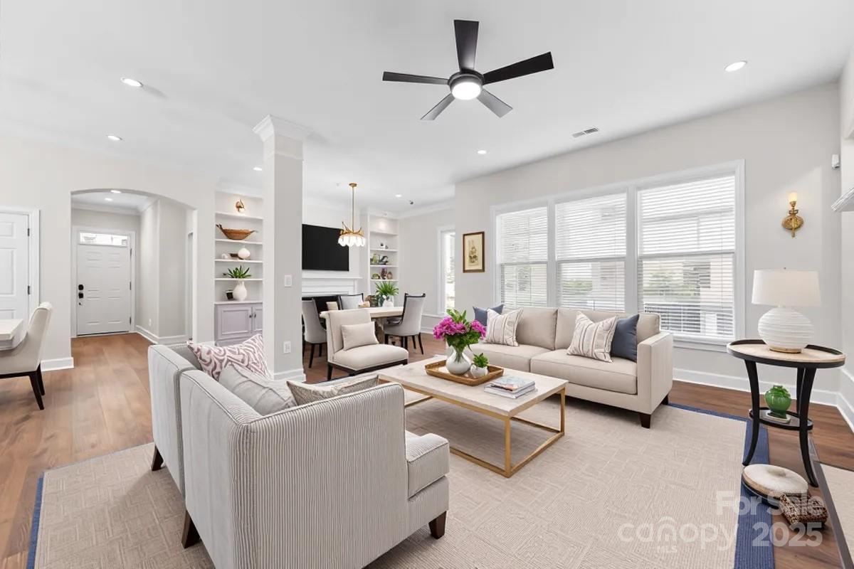 4148 Cedar Point Avenue Matthews, NC 28104 - Photo 9 of 48 a living room with furniture and a large window