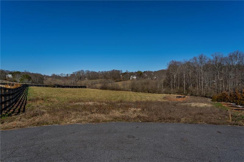 5170 Howard Road Cumming, GA 30040 - Photo 18 of 18 a view of lake with mountain in background