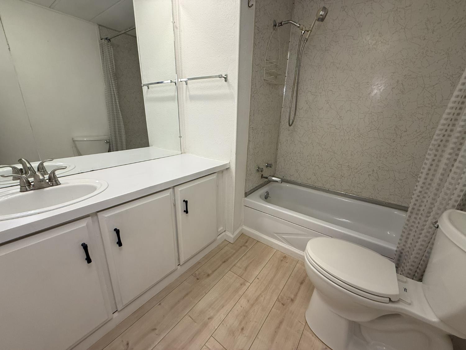15679 Ware Lane Rackerby, CA 95972 - Photo 16 of 35 a bathroom with a sink a toilet and shower