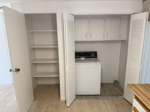 a room with storage and utility