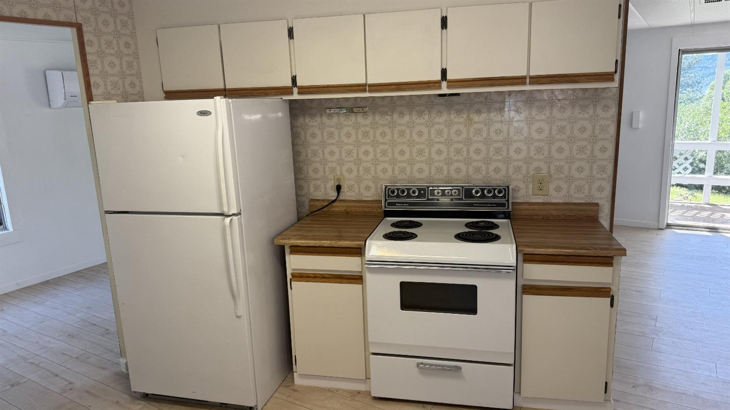 15679 Ware Lane Rackerby, CA 95972 - Photo 5 of 35 a white refrigerator freezer and a stove sitting inside of a kitchen