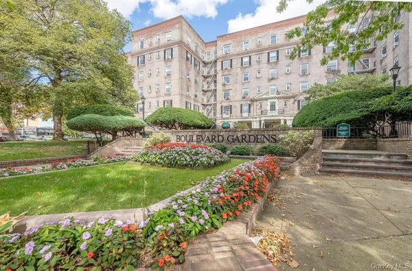a view of a garden with a bench