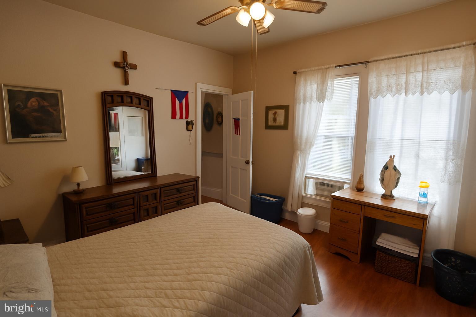 1535 Haak Street Reading, PA 19602 - Photo 13 of 33 a bedroom with a bed and a dresser next to a window