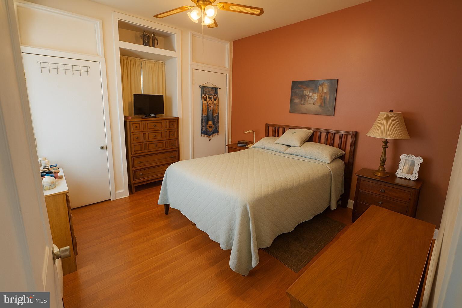 1535 Haak Street Reading, PA 19602 - Photo 19 of 33 a bedroom with a bed and a chandelier