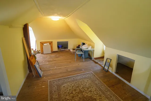 a living room with chairs