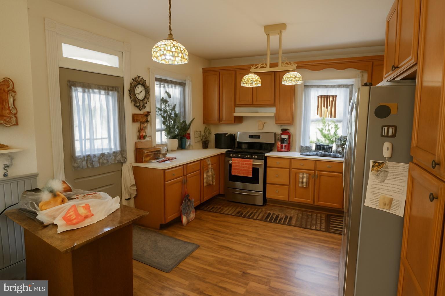 1535 Haak Street Reading, PA 19602 - Photo 7 of 33 a kitchen that has a lot of cabinets in it