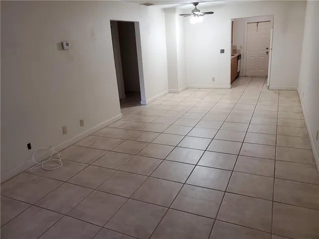 a view of a house with a street