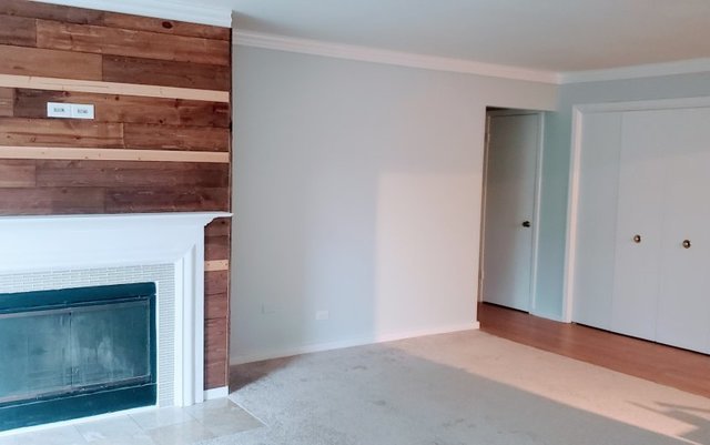 714 East Algonquin Road, Unit J205 Arlington Heights, IL 60005 - Photo 3 of 14 a view of an empty room