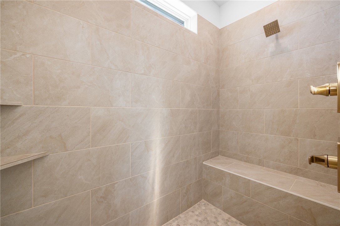 6524 Agave Court Bryan, TX 77808 - Photo 30 of 43 Bathroom featuring a tile shower