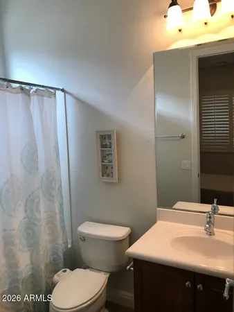 a bathroom with a sink and a toilet