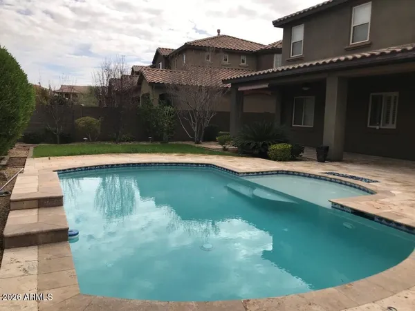 a view of a house with a patio