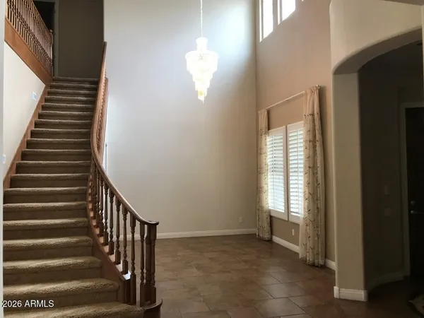 a view of entryway with stairs