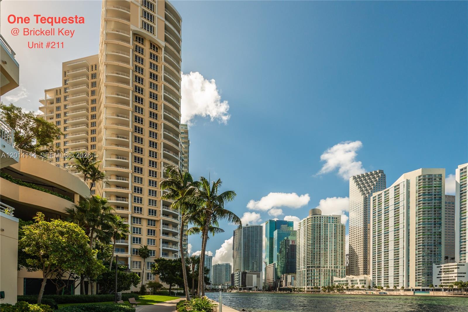 888 Brickell Key Drive, Unit 211 Miami, FL 33131 - Photo 1 of 28 a front view of a building with street view