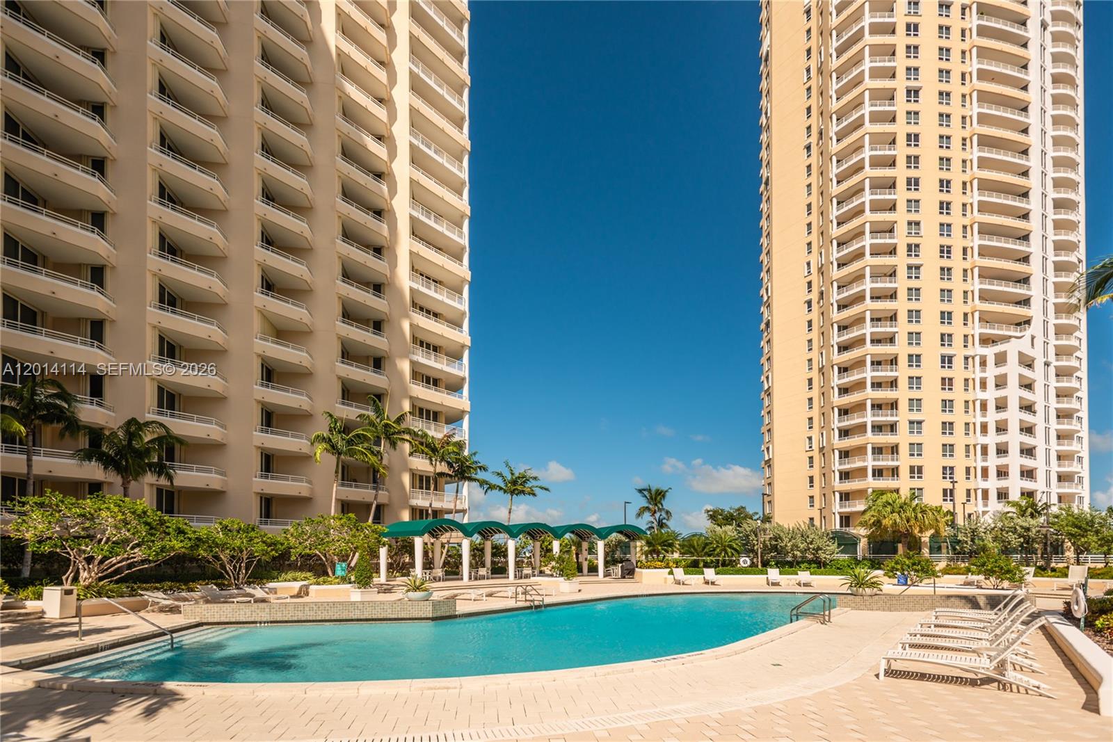 888 Brickell Key Drive, Unit 211 Miami, FL 33131 - Photo 2 of 28 front view of a building