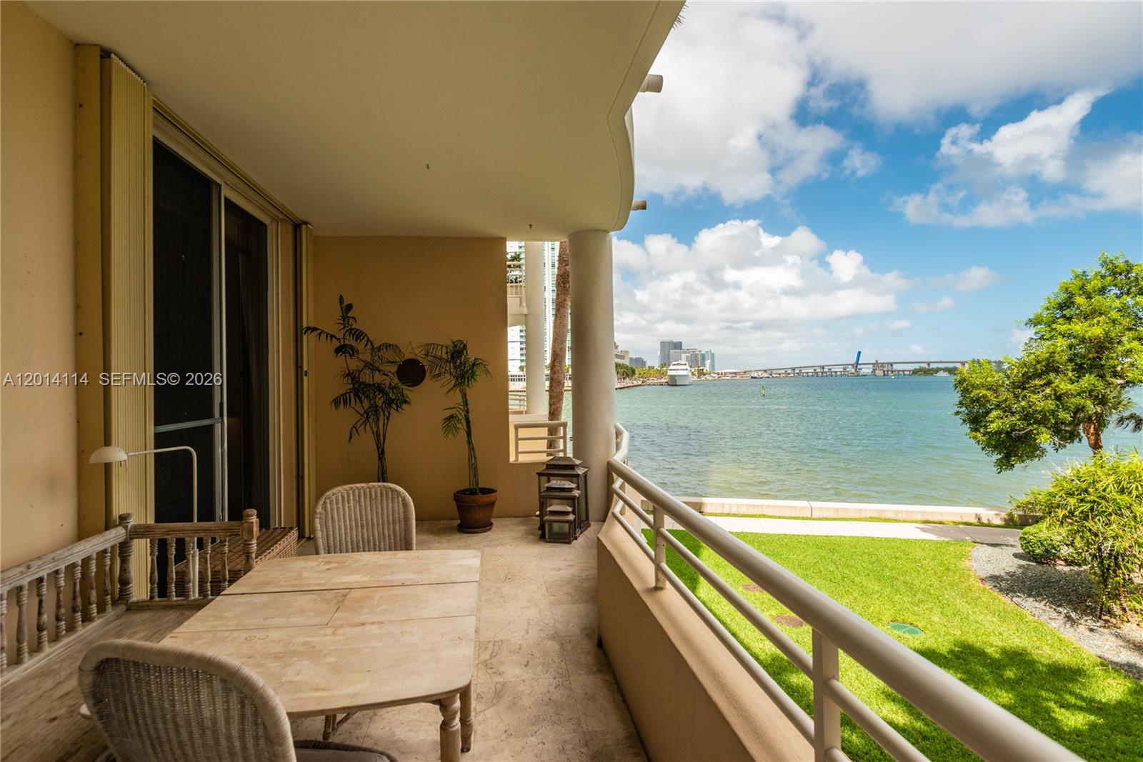 888 Brickell Key Drive, Unit 211 Miami, FL 33131 - Photo 23 of 28 a view of a balcony with a patio