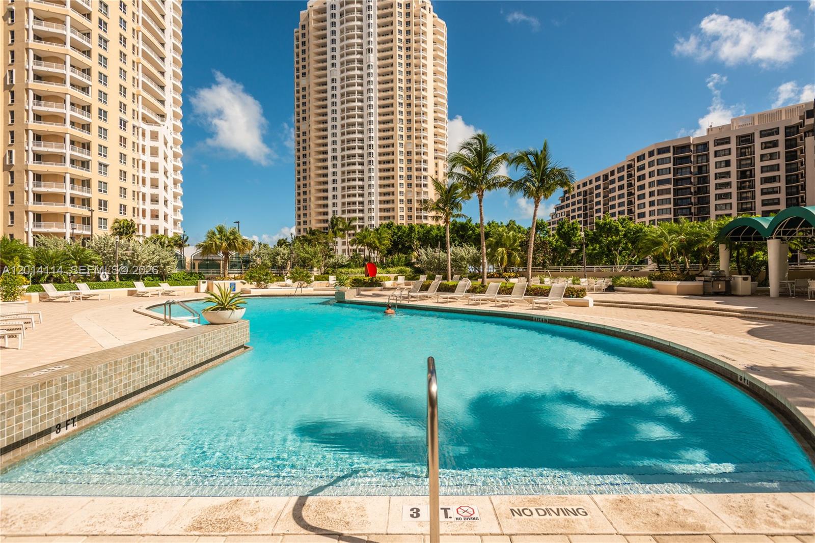 888 Brickell Key Drive, Unit 211 Miami, FL 33131 - Photo 26 of 28 a city view with tall buildings