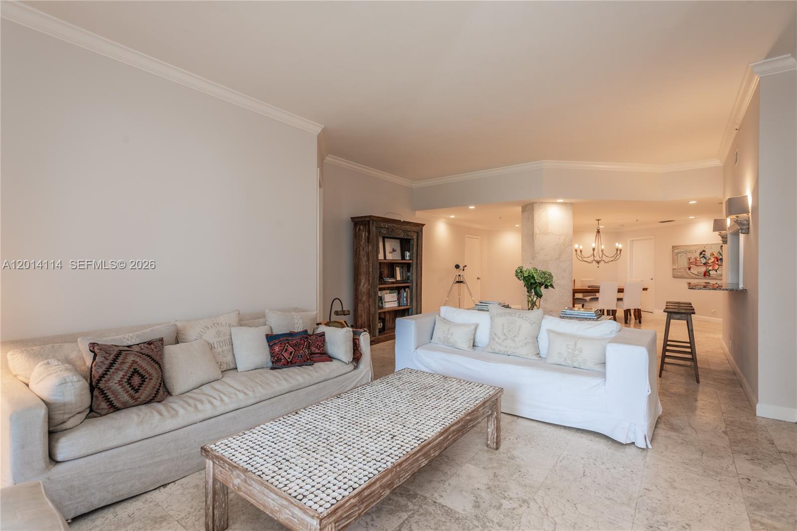 888 Brickell Key Drive, Unit 211 Miami, FL 33131 - Photo 5 of 28 a living room with furniture and a couch