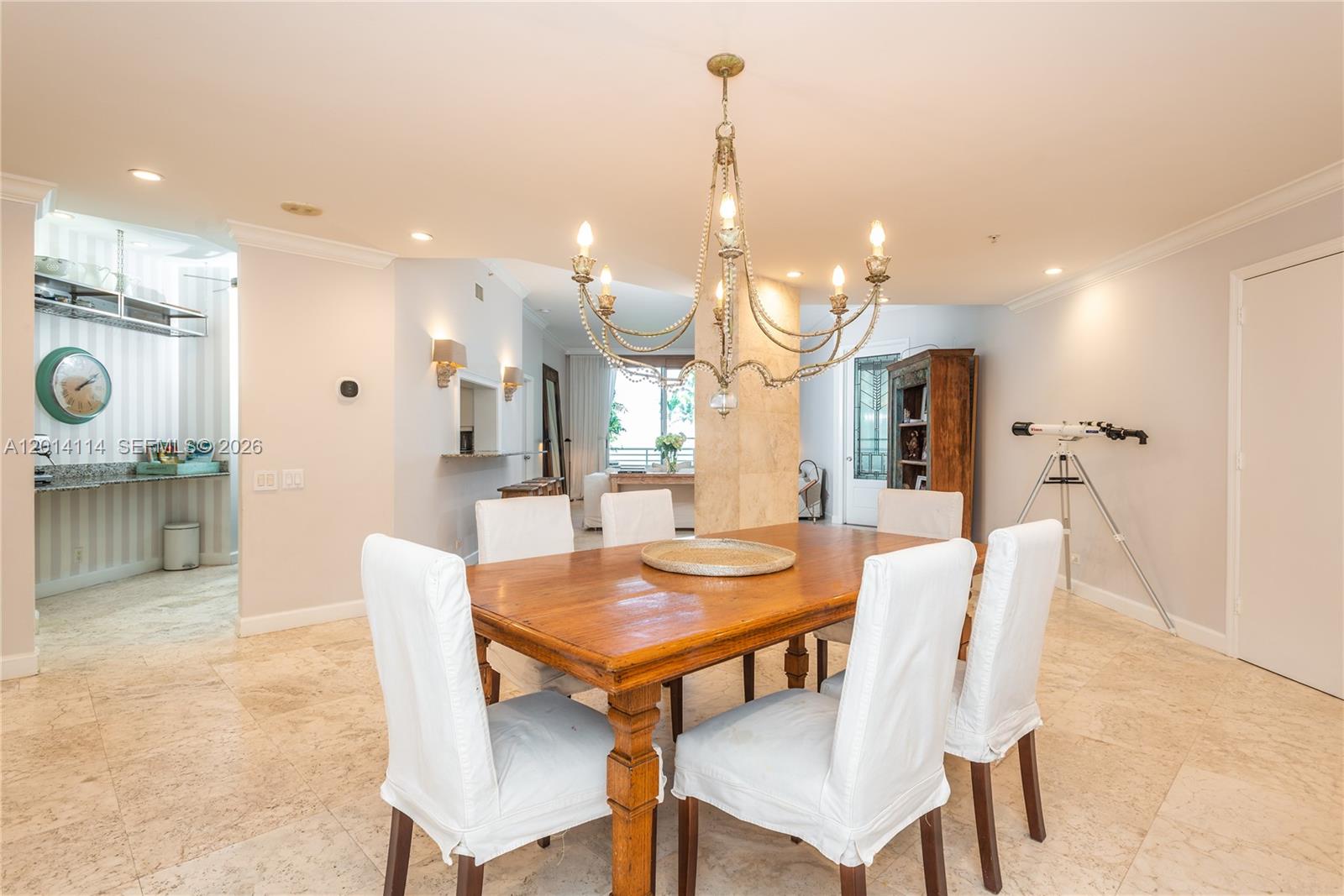 888 Brickell Key Drive, Unit 211 Miami, FL 33131 - Photo 6 of 28 a view of a dining room and livingroom