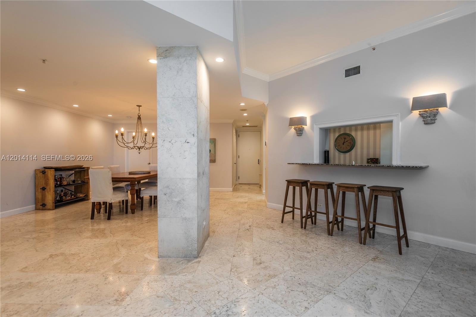 888 Brickell Key Drive, Unit 211 Miami, FL 33131 - Photo 7 of 28 a view of a livingroom with furniture and a flat screen tv