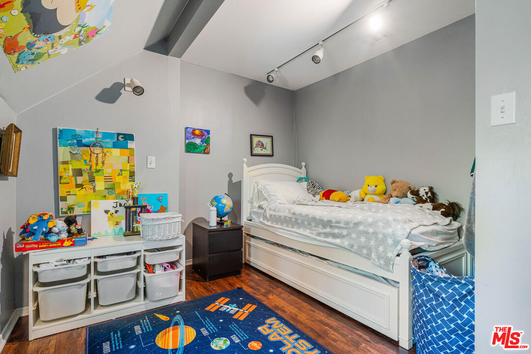 24975 Kit Carson Road Hidden Hills, CA 91302 - Photo 32 of 38 a bed room with a bed and a window