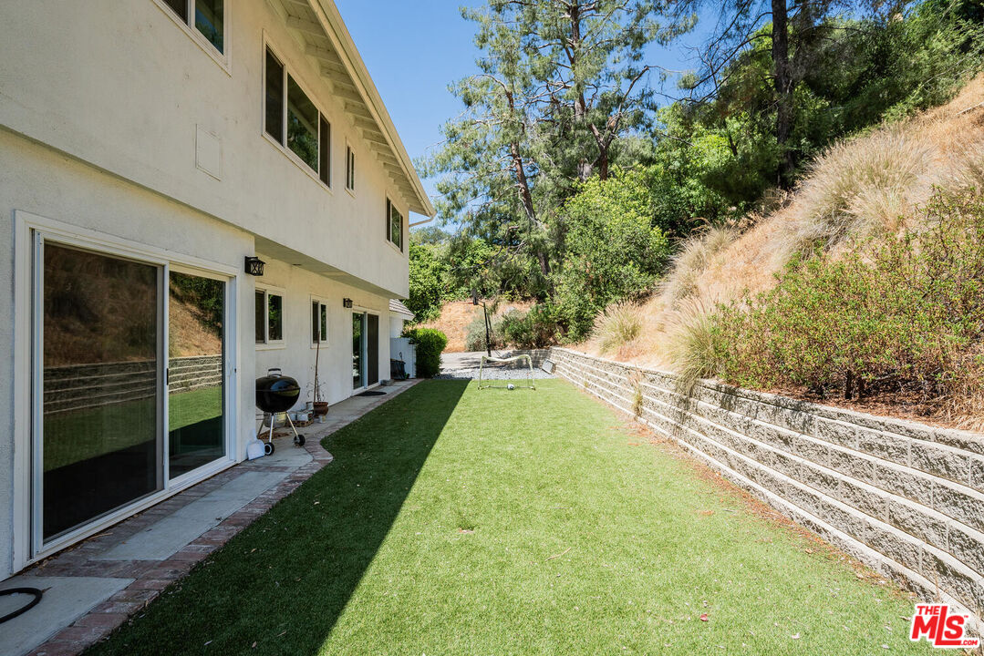 24975 Kit Carson Road Hidden Hills, CA 91302 - Photo 36 of 38 a view of a yard in front of house