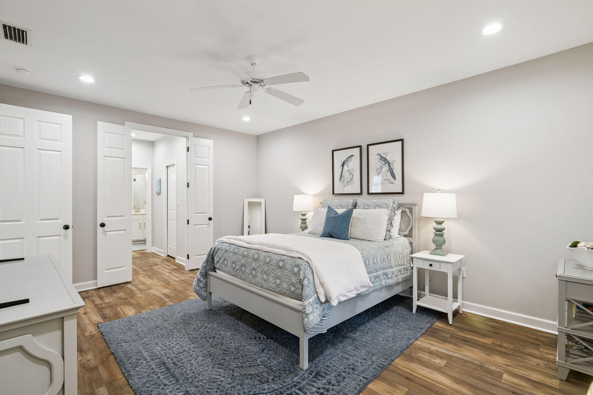 1994 Shannons Cove Miramar Beach, FL 32550 - Photo 22 of 44 a spacious bedroom with a bed and a dresser