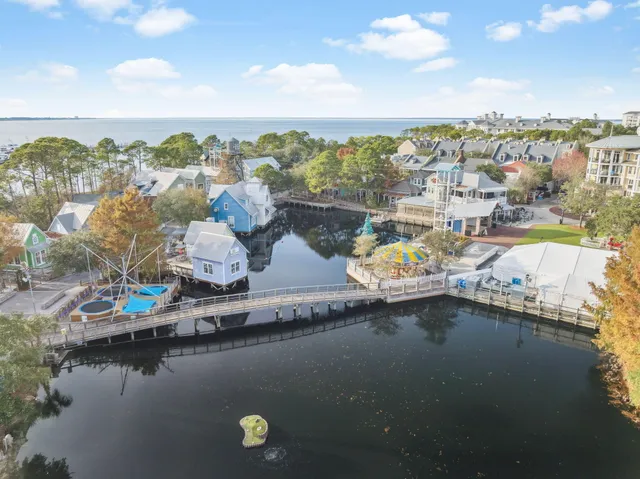 an aerial view of a house with a ocean view