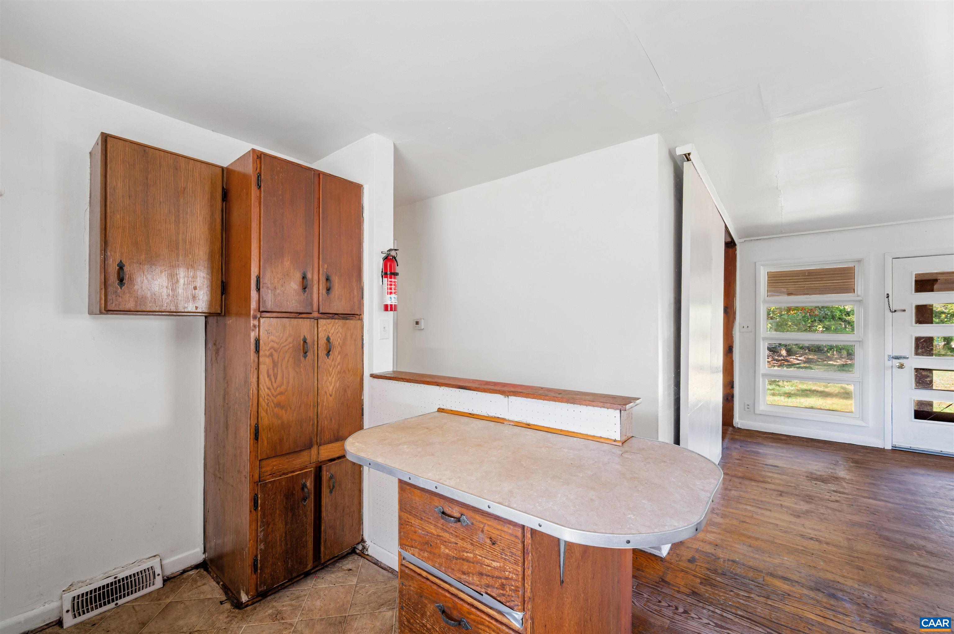 2302 Summit Road Charlottesville, VA 22901 - Photo 15 of 39 a kitchen with stainless steel appliances granite countertop a refrigerator and a stove