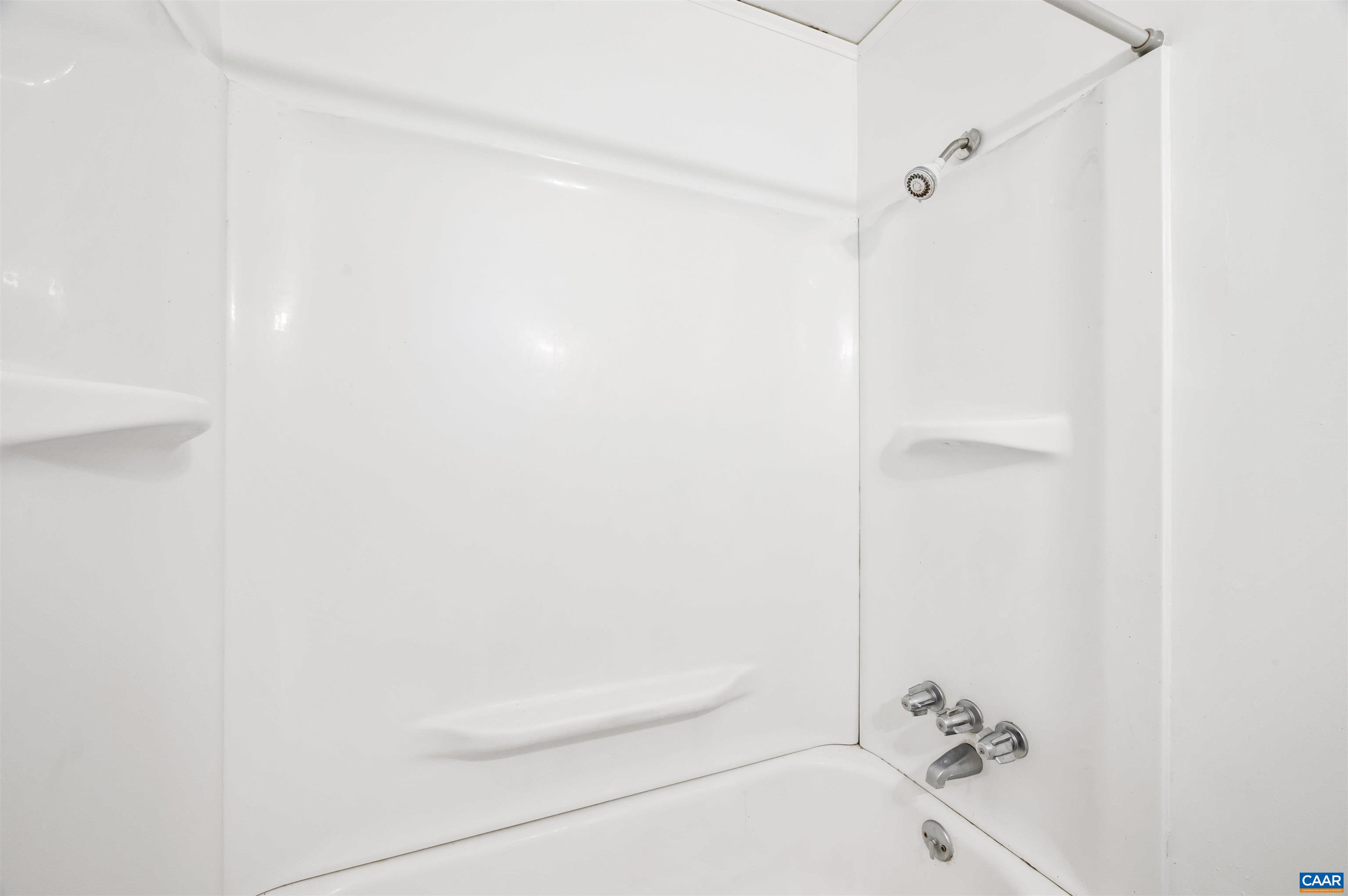 2302 Summit Road Charlottesville, VA 22901 - Photo 25 of 39 a bathroom with a bathtub