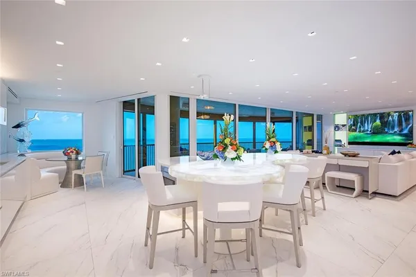 a view of a dining room with furniture