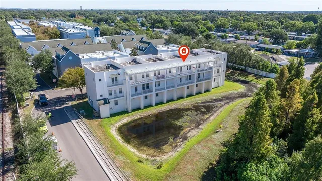 a view of a swimming pool with a terrace