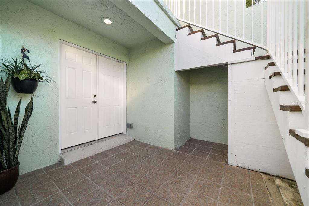 1 Windrush Boulevard, Unit 45 Indian Rocks Beach, FL 33785 - Photo 34 of 53 a view of entryway with wooden floor