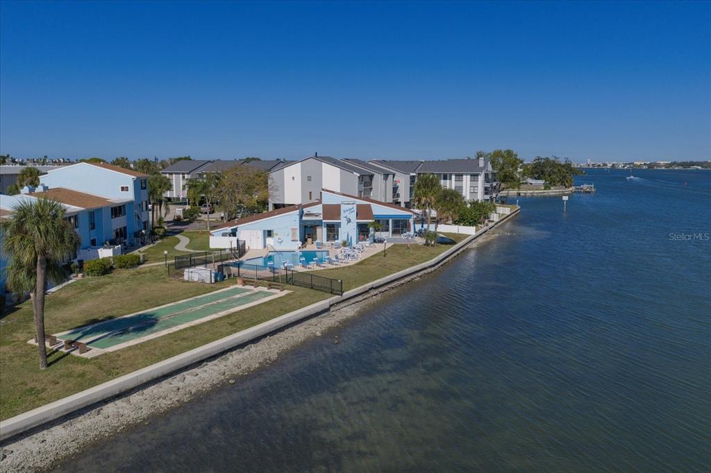 1 Windrush Boulevard, Unit 45 Indian Rocks Beach, FL 33785 - Photo 35 of 53 a view of a city street with a building in the background