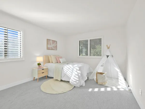 a view of empty room with ceiling fan