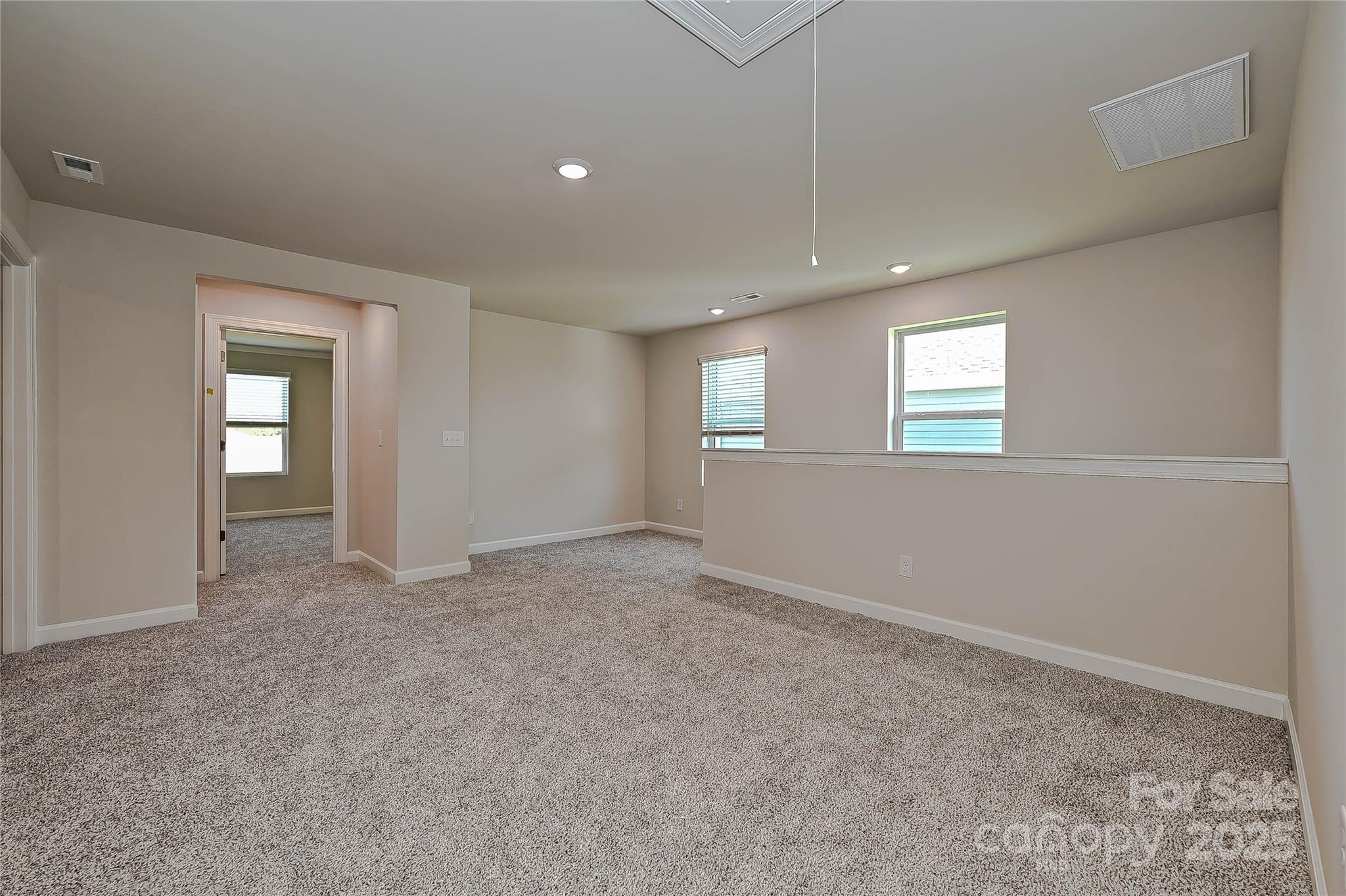 1500 31st Street Northeast Conover, NC 28613 - Photo 7 of 12 an empty room with windows