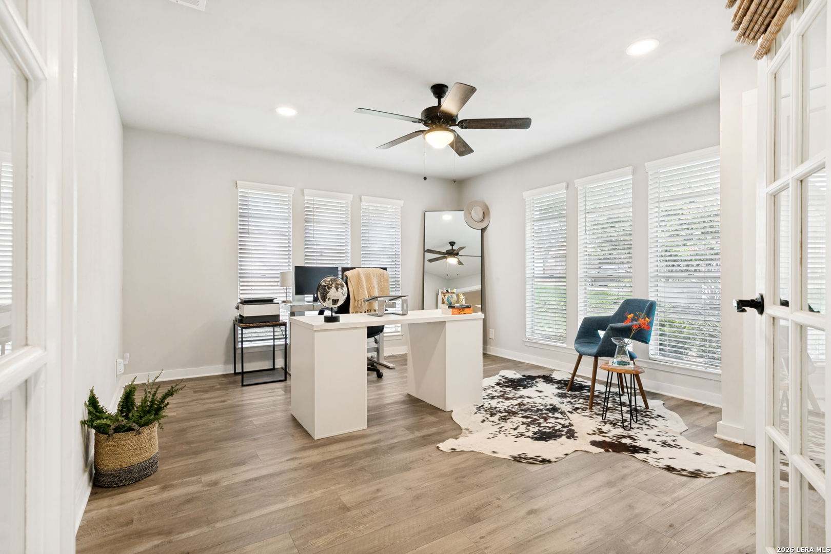 102 Silver Spring Universal City, TX 78148 - Photo 16 of 36 a living room with furniture appliances and a large window