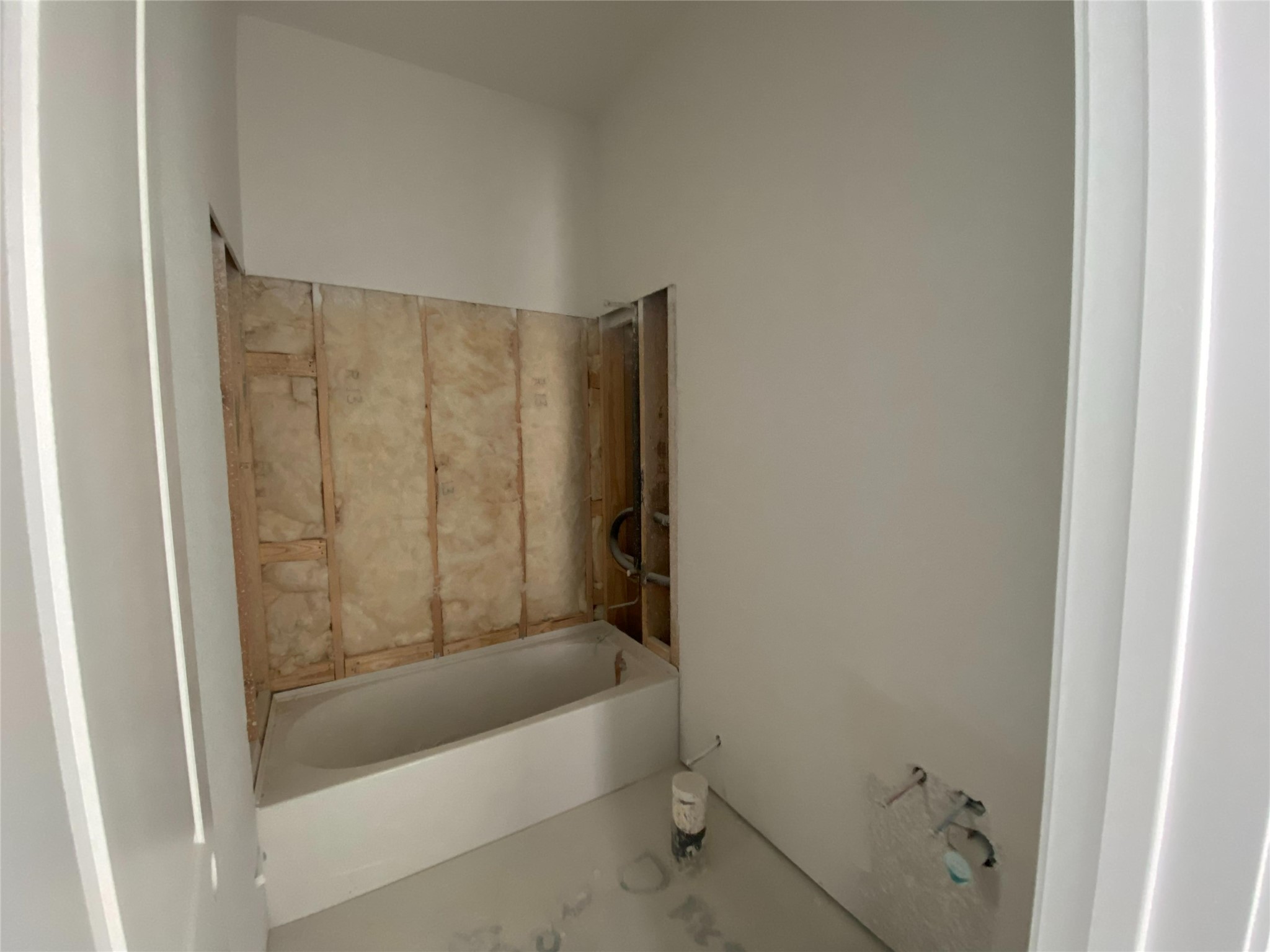 23631 Red Rowan Katy, TX 77493 - Photo 8 of 15 a bathroom with a bathtub and a shower