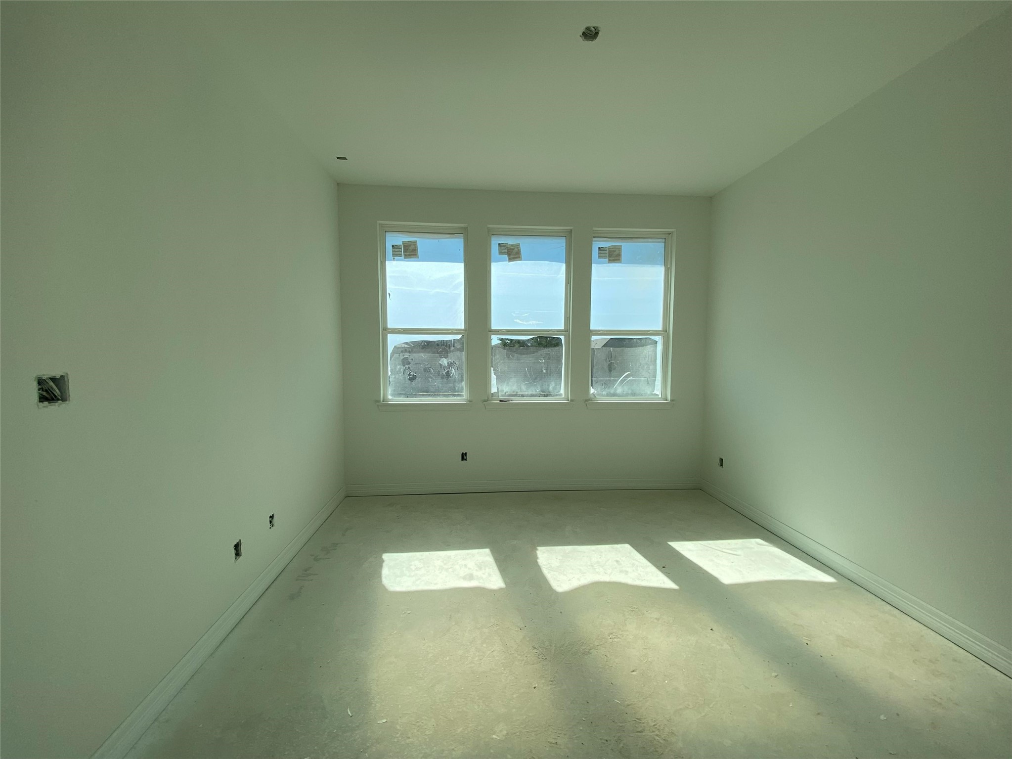 23631 Red Rowan Katy, TX 77493 - Photo 9 of 15 an empty room with windows