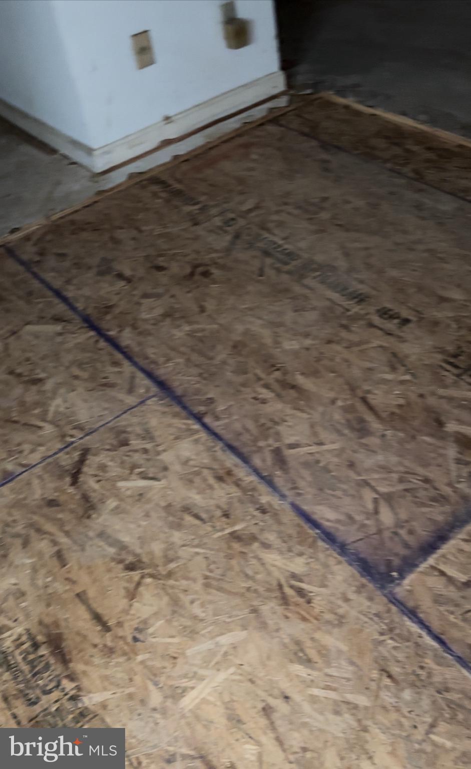1669 Columbia Road Northwest, Unit 113 Washington, DC 20009 - Photo 5 of 25 Floor joists have been replaced in living room.