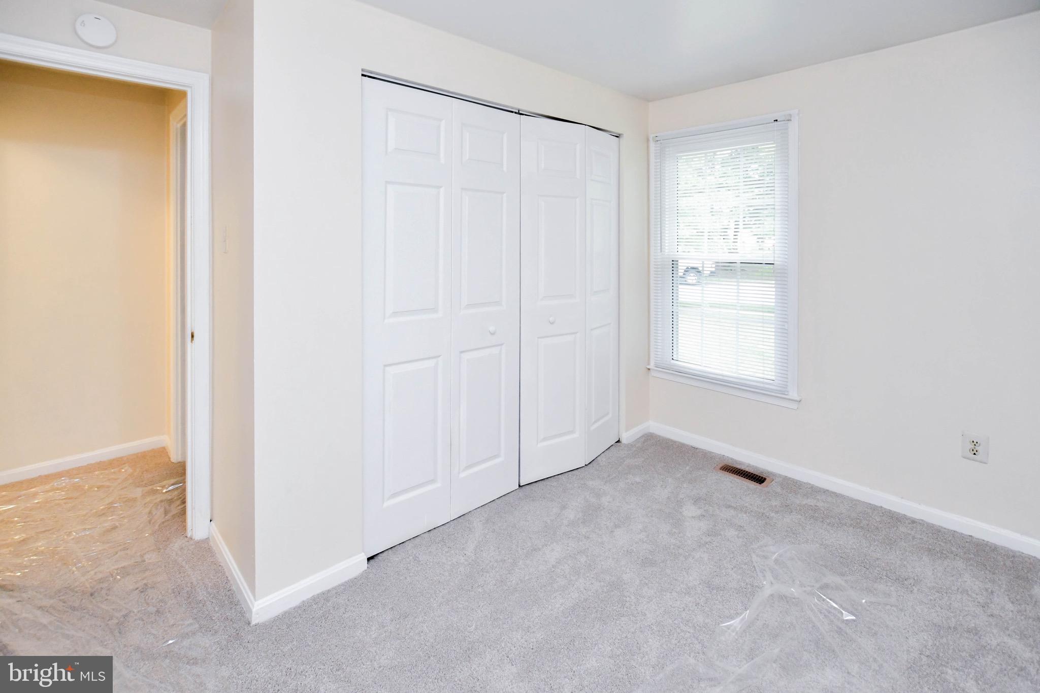 12411 Sturdee Drive Upper Marlboro, MD 20772 - Photo 22 of 39 an empty room with windows and closet