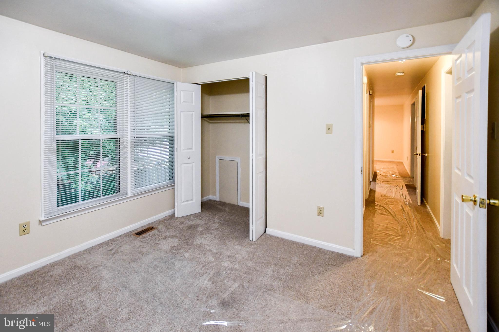 12411 Sturdee Drive Upper Marlboro, MD 20772 - Photo 25 of 39 an empty room with windows and closet