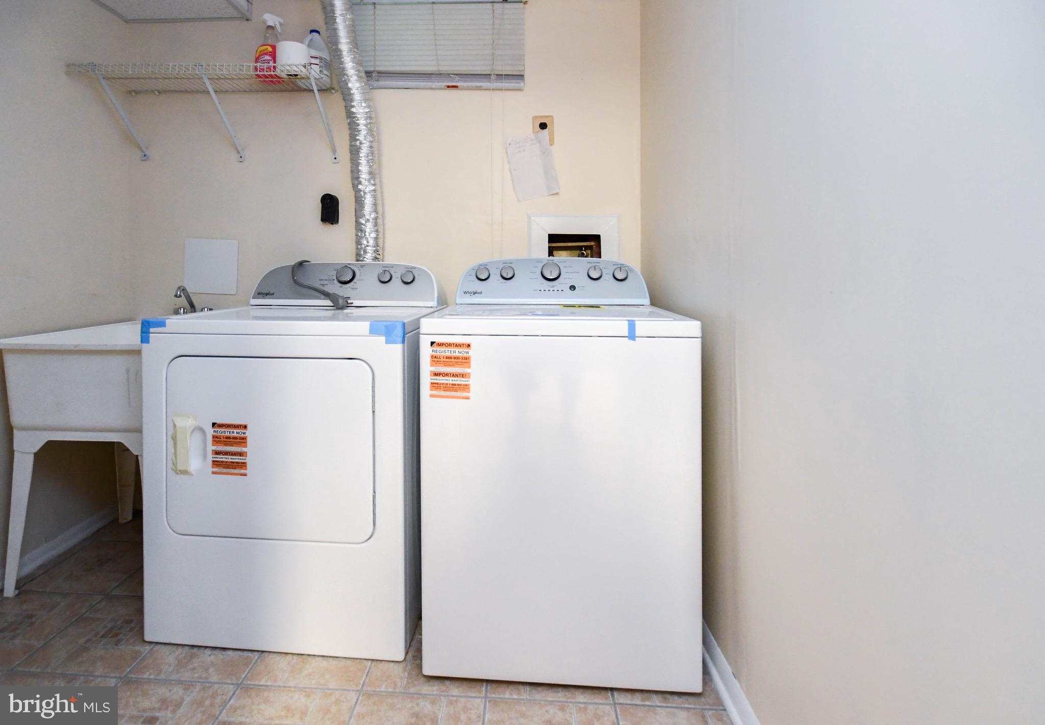 12411 Sturdee Drive Upper Marlboro, MD 20772 - Photo 30 of 39 a utility room with dryer and washer