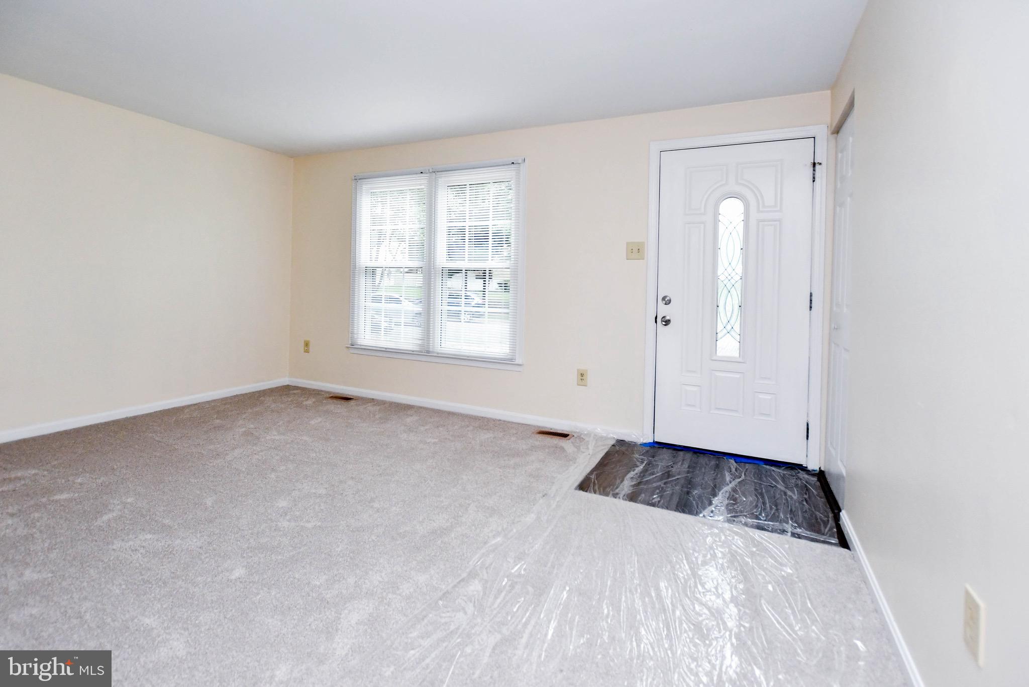 12411 Sturdee Drive Upper Marlboro, MD 20772 - Photo 5 of 39 an empty room with windows