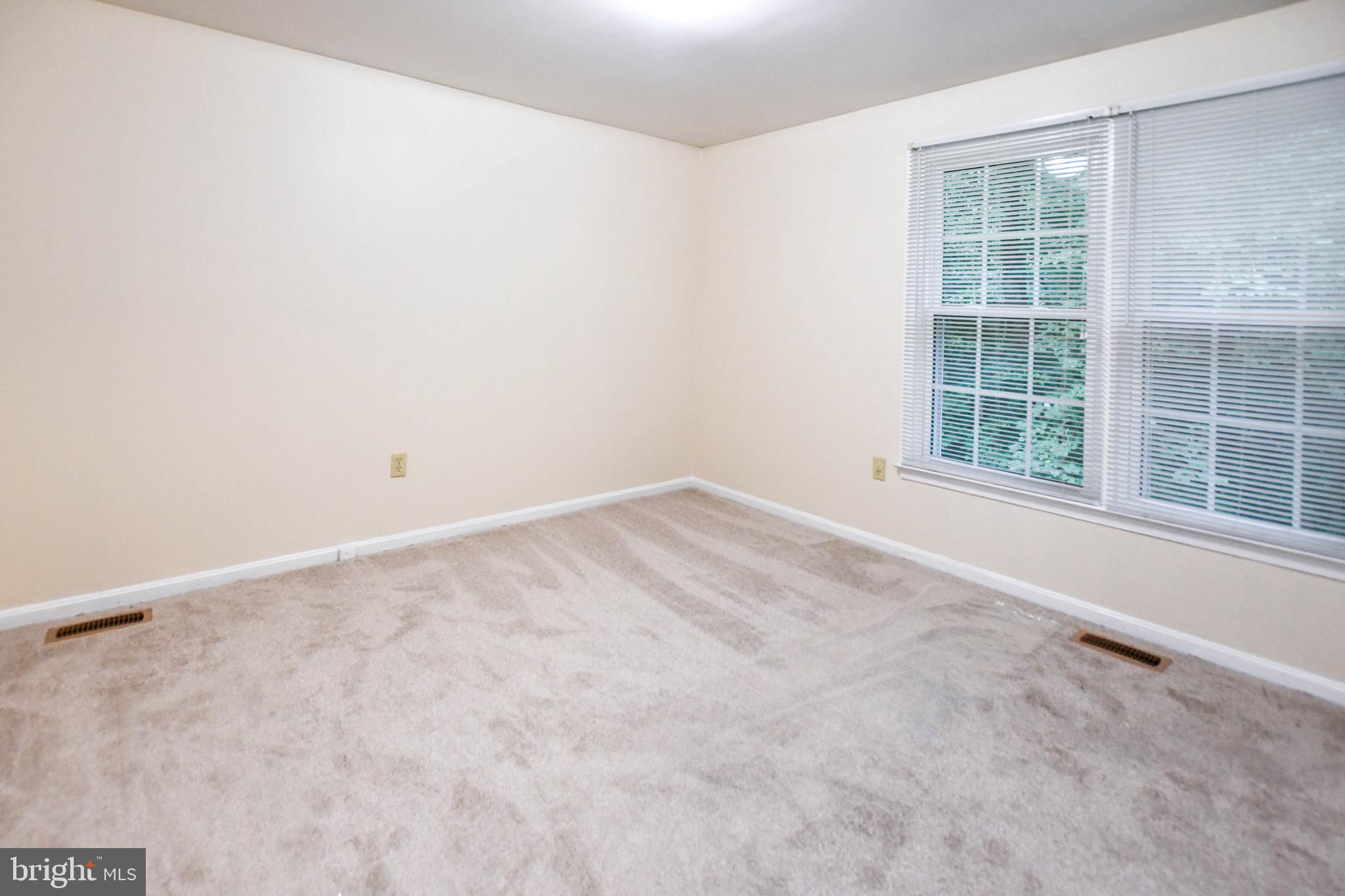 12411 Sturdee Drive Upper Marlboro, MD 20772 - Photo 6 of 39 an empty room with a window