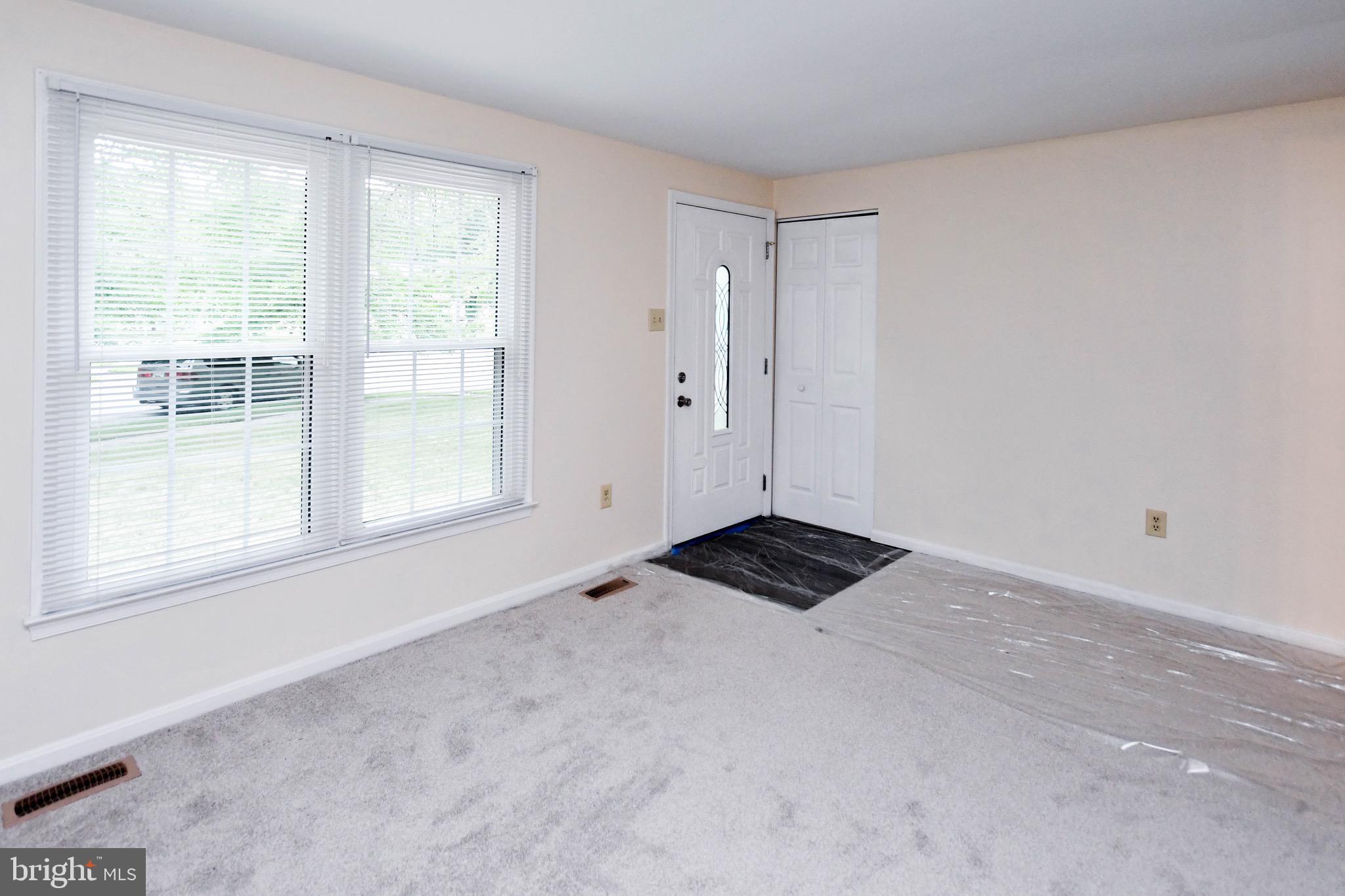 12411 Sturdee Drive Upper Marlboro, MD 20772 - Photo 7 of 39 a view of an empty room and window