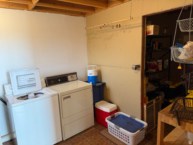 358 South Sky Drive Torrey, UT 84775 - Photo 22 of 82 Dedicated laundry area featuring a tile-patterned floor and exposed ceiling joists