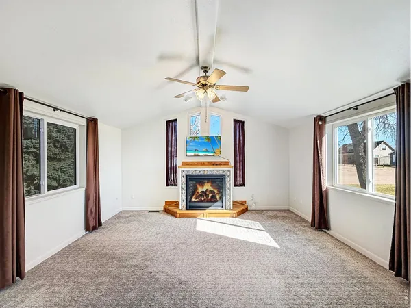 a bedroom with furniture and window