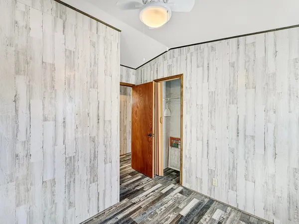 a view of a bathroom with a shower curtain